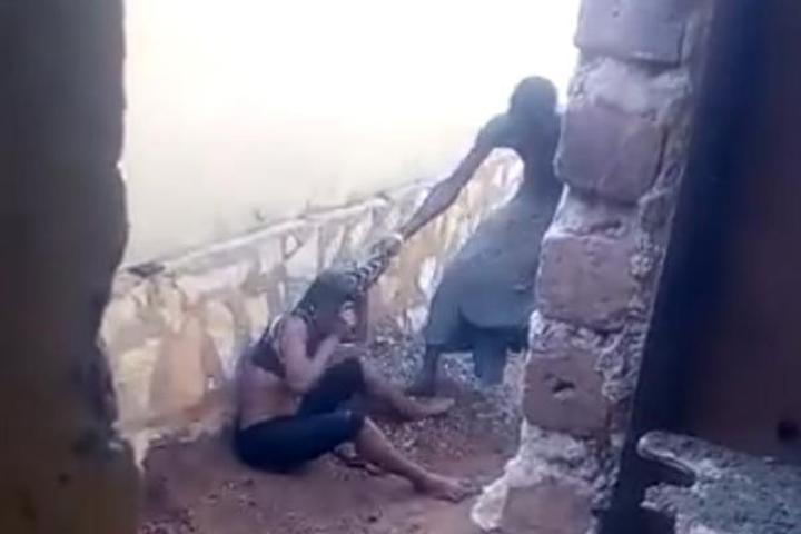 Police detain man filmed battering his wife in Kampala Police detain man filmed battering his wife in Kampala