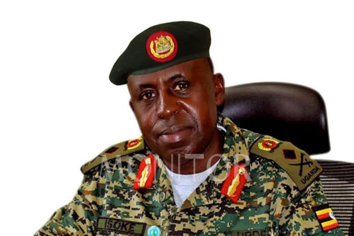 The general stepping into Nakalema boots The general stepping into Nakalema boots