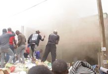 Fire Destroys Wholesale Building at Kikollege Center Fire Destroys Wholesale Building at Kikollege Center