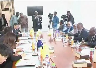 مباحثات مشتركة بين الوطني السوداني والشيوعي الصيني بالخرطوم