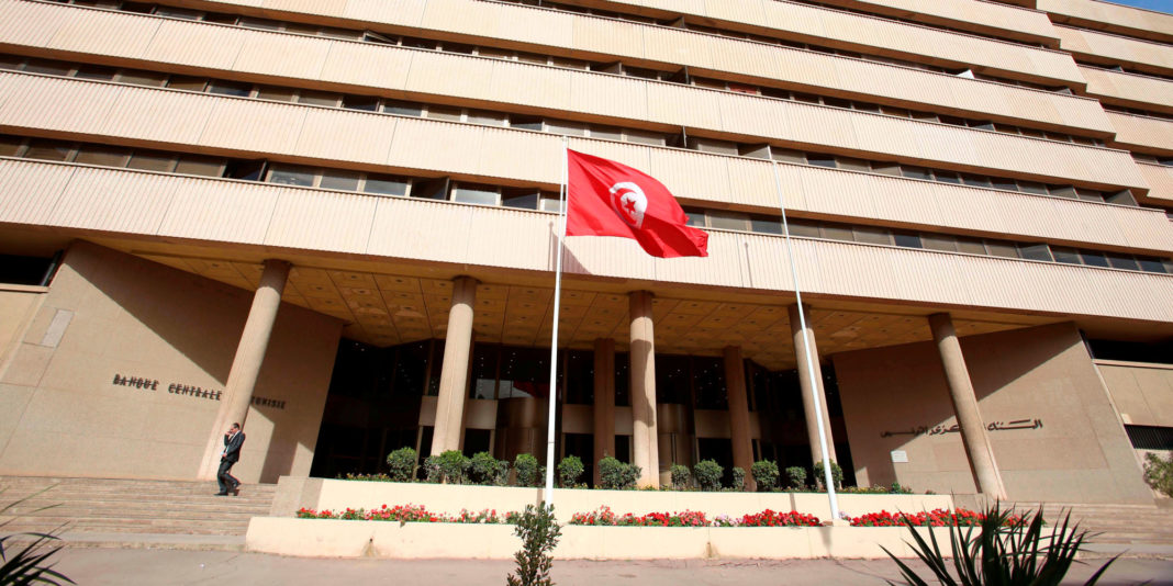 A man walks out of the Central Bank in Tunis
