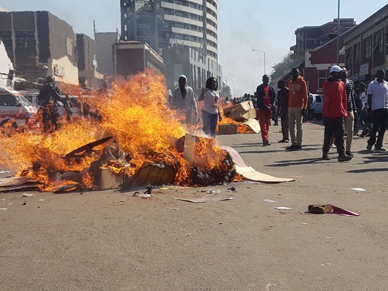 Zimbabwe election: Three dead in violent Harare protests as security forces battle demonstrators after Zanu-PF win in parliament vote
