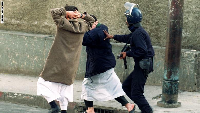 A member of Algerian security forces arr