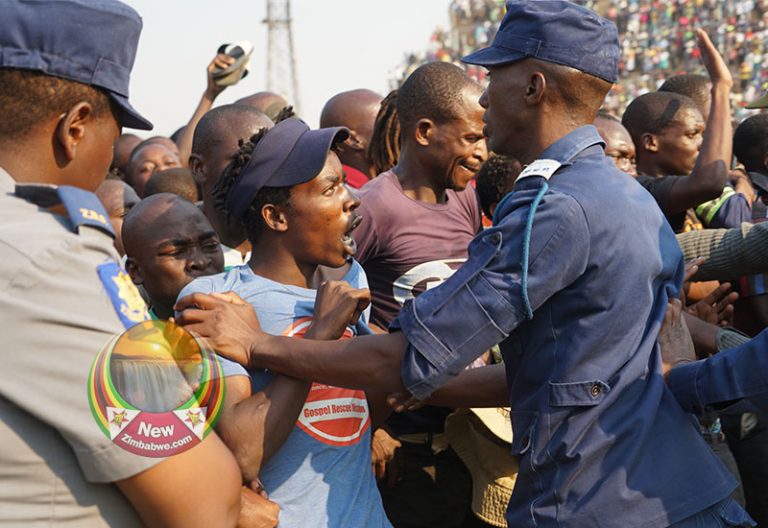 Dozens injured in stadium stampede to view Mugabe body