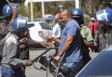 Zimbabwe court rules journalist danger to public, extends detention