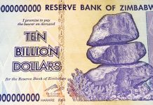 Currency in free fall, Zimbabwe tries forex auction system dating back 16 years