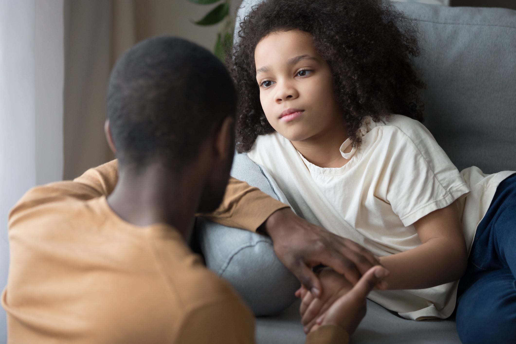Loving black father talk supporting upset daughter