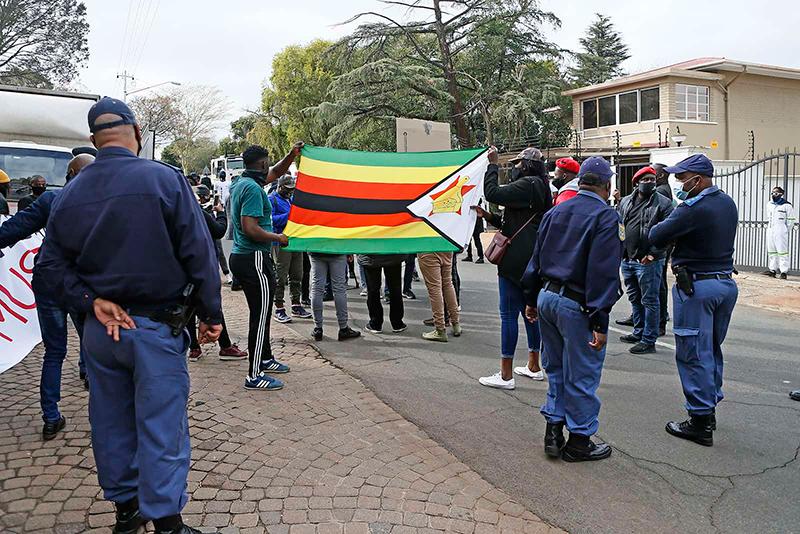 Zimbabweans in SA fear attacks as permits expire; rumours rife locals plan to chase them out of homes Zimbabweans in SA fear attacks as permits expire; rumours rife locals plan to chase them out of homes