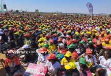 Soldiers Distribute ZANU PF Regalia At Rally Soldiers Distribute ZANU PF Regalia At Rally